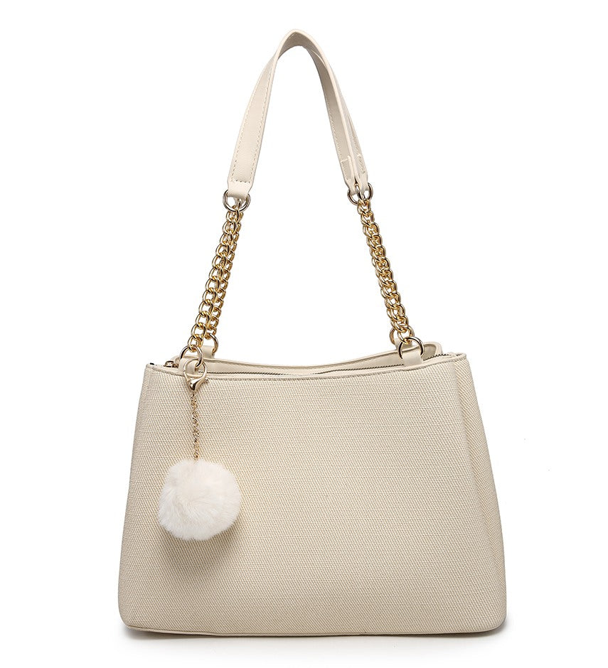 Beige Textured Handbag with Pom-Pom Detail