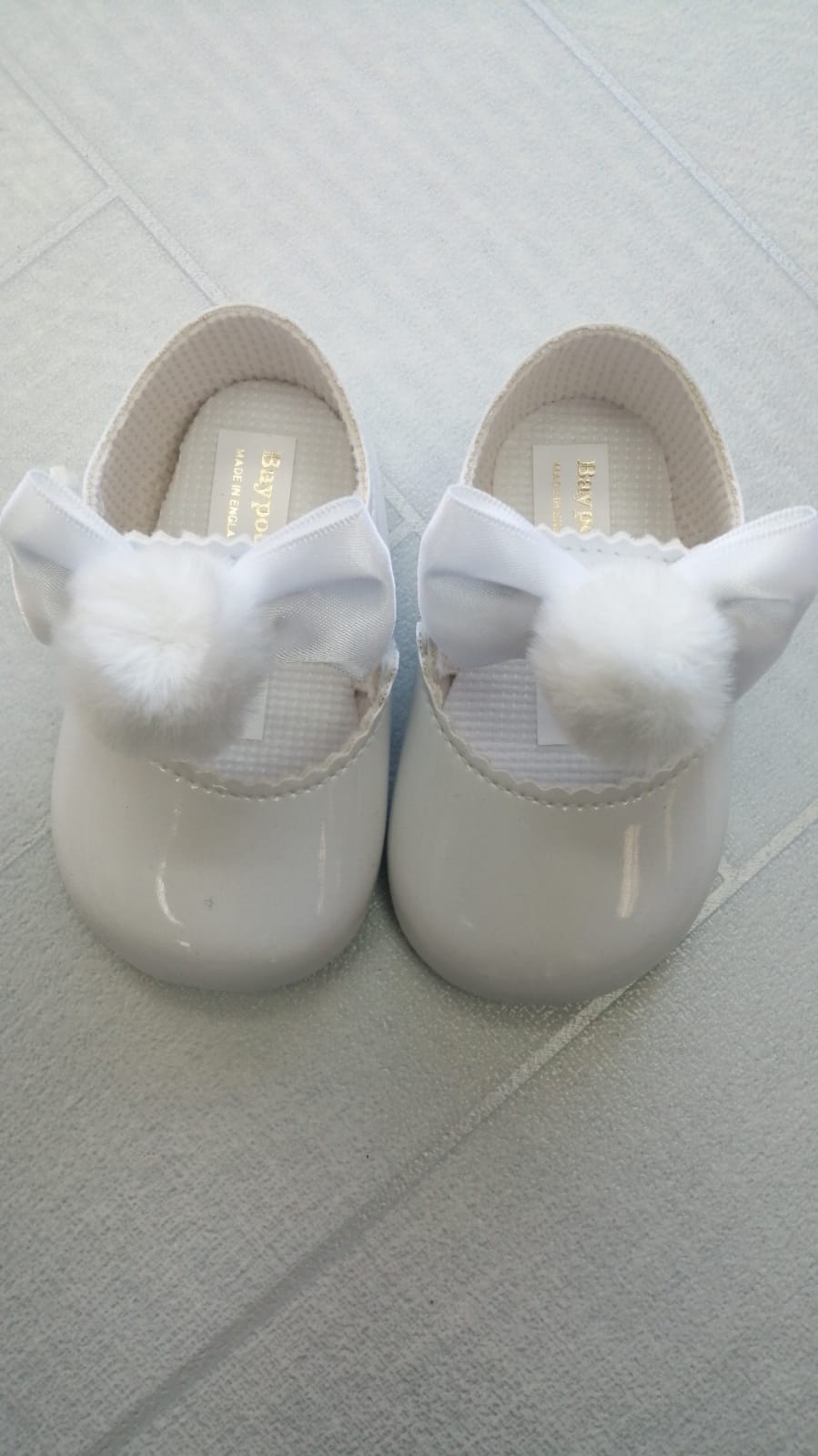 Pompom christening shoe