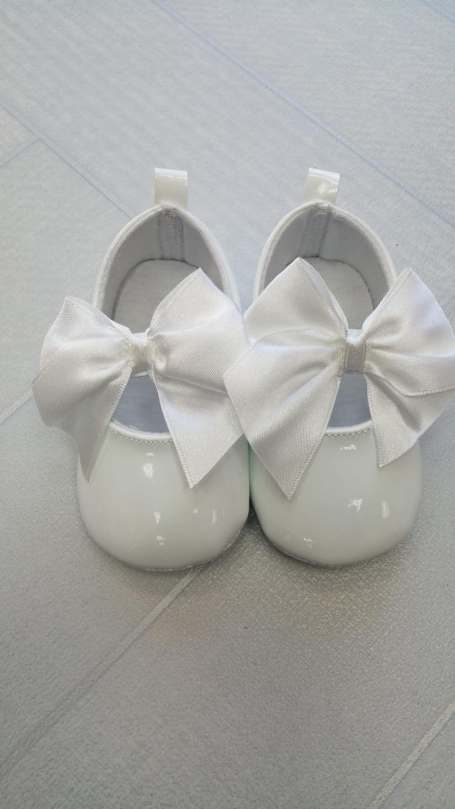 Bow strap christening shoe