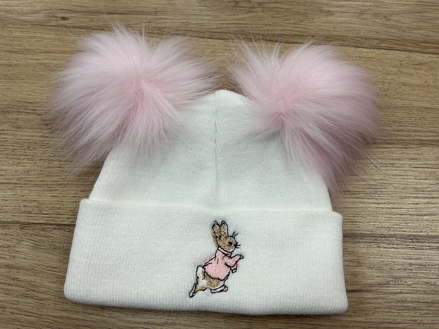 Large Pink embroidered Peter rabbit white hat with pink faux Pom poms and turnover