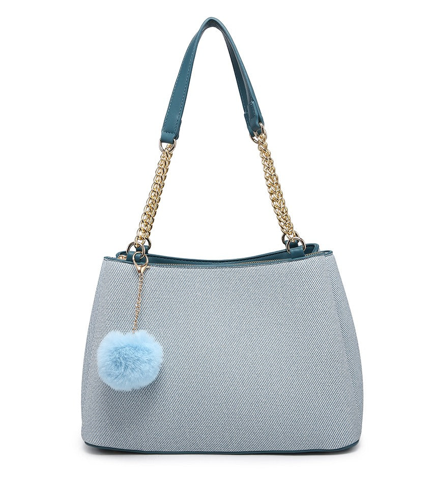 Blue Textured Handbag with Pom-Pom Detail