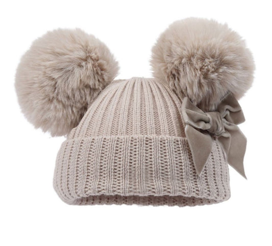 Ribbed biscuit hat with pom poms , turnover and velvet bow