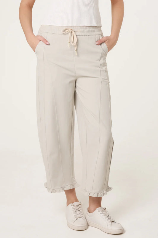 Stone Ruffled Hem Seam Trousers