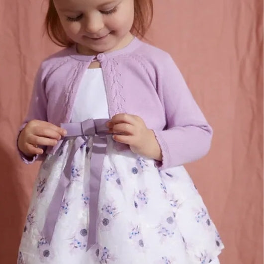 Lilac and white dress with printed and embroidered organza over skirt with pants.