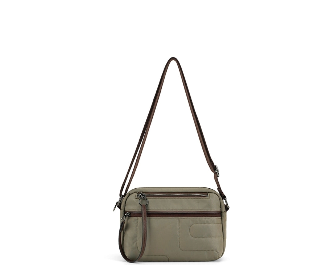Soft Shell modern Round Crossbody Bag with Two Front Zip Pockets and Square Pattern