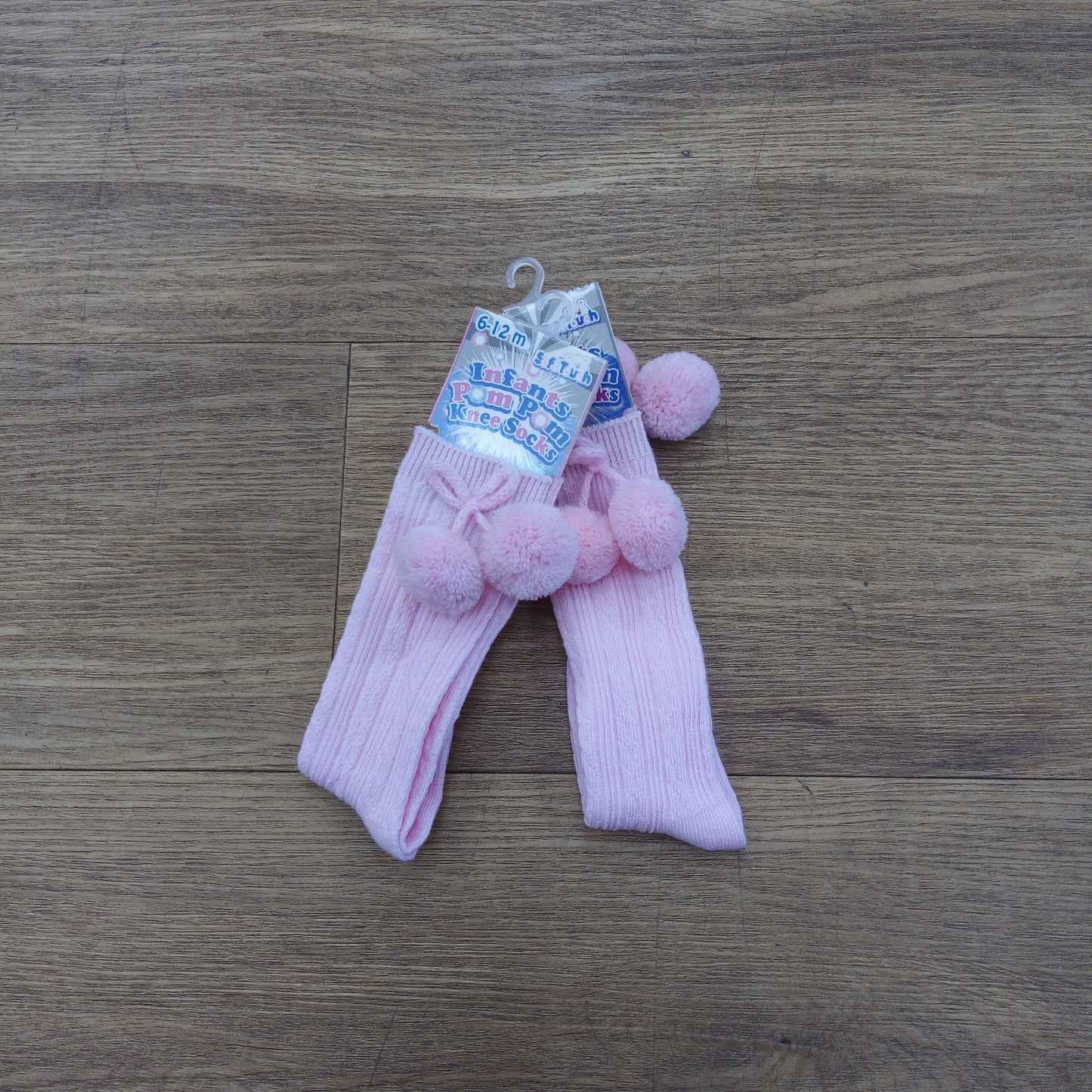 Pink pom pom knee socks