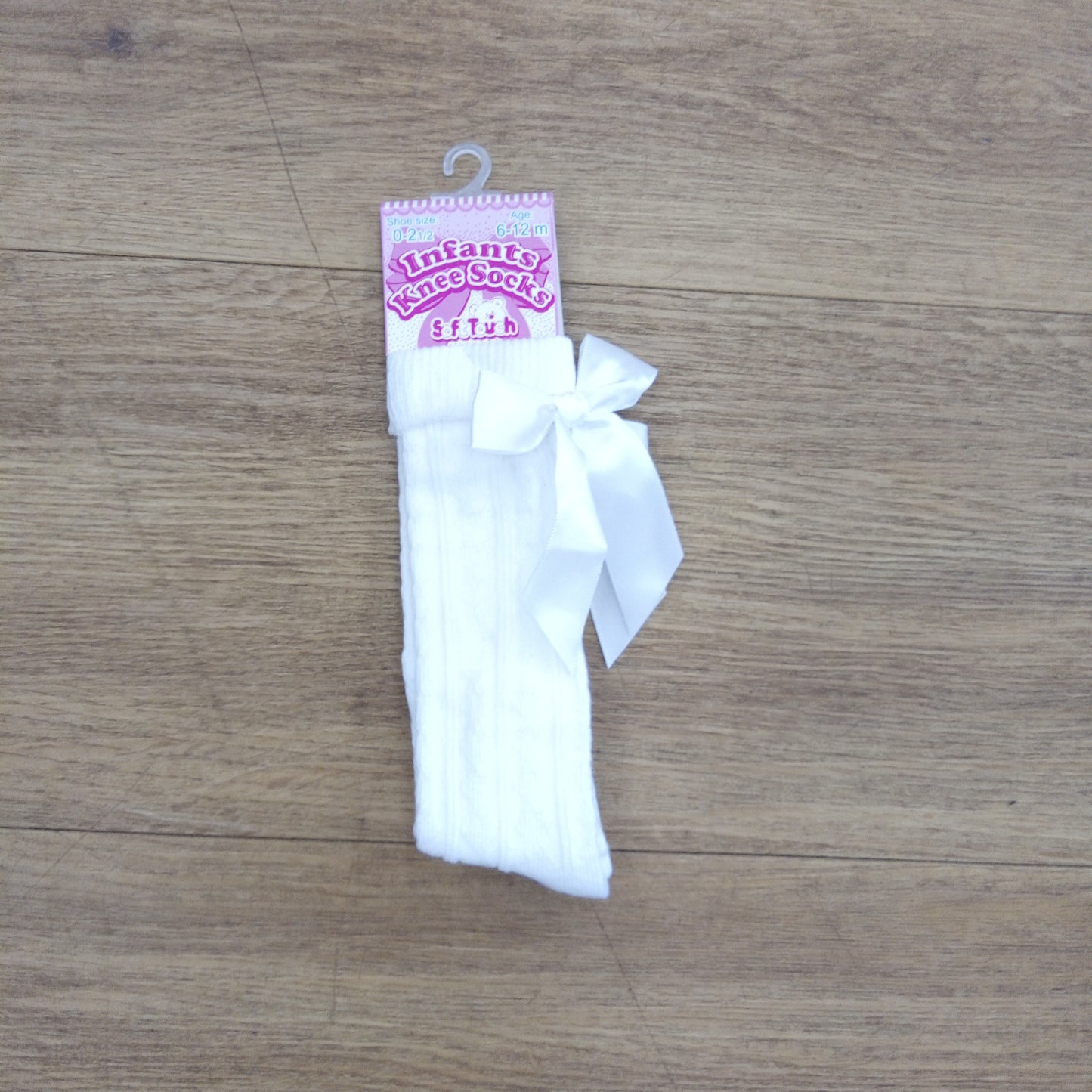 White knee bow sock
